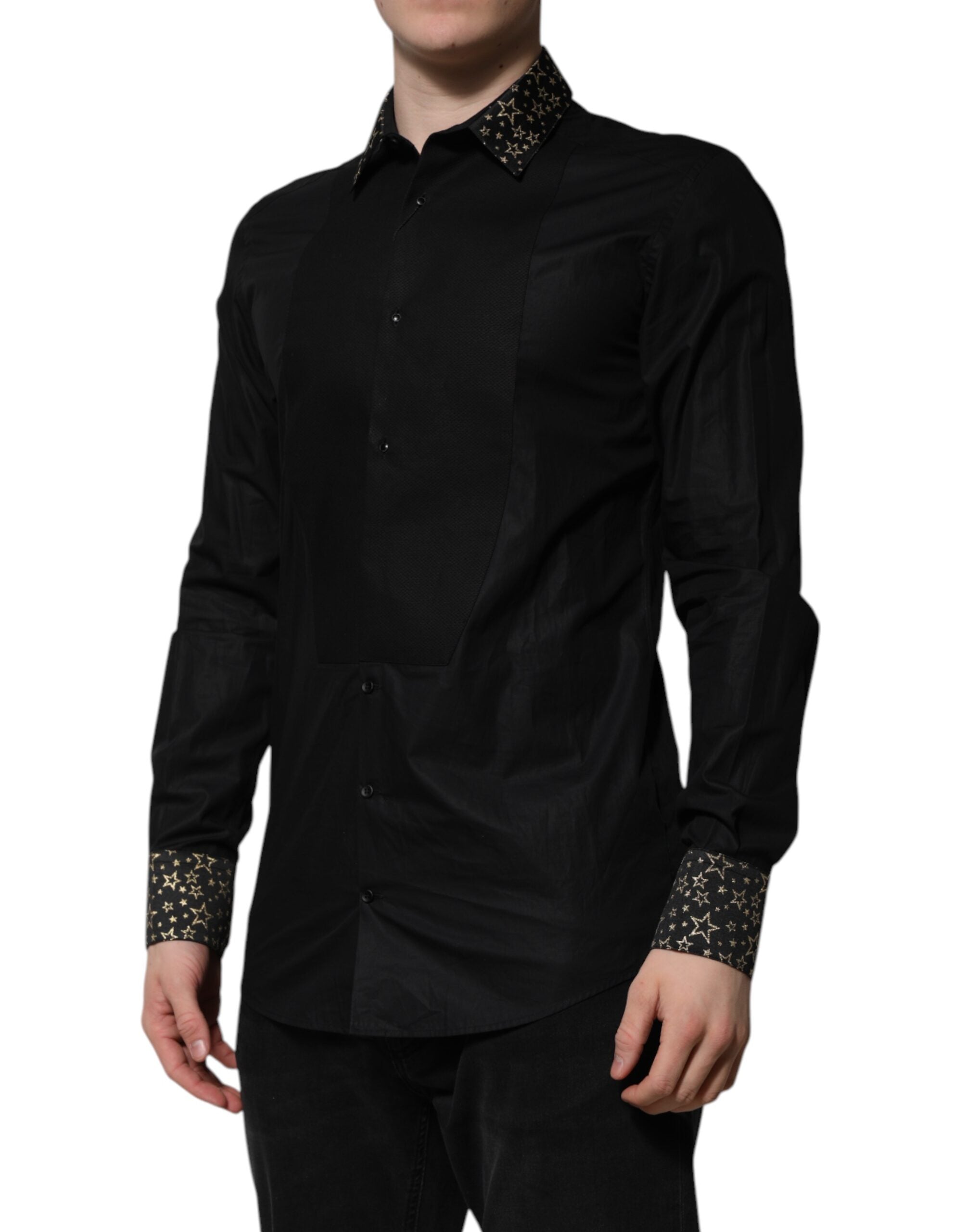 Chemise Dolce & Gabbana en coton noir à manches longues avec détails dorés, élégante et classique.
