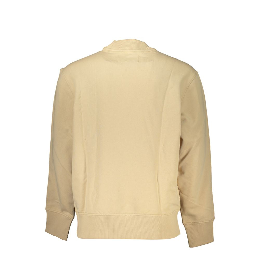 Sweatshirt beige en coton pour homme de Calvin Klein, avec col rond et manches longues, porté sur un modèle.