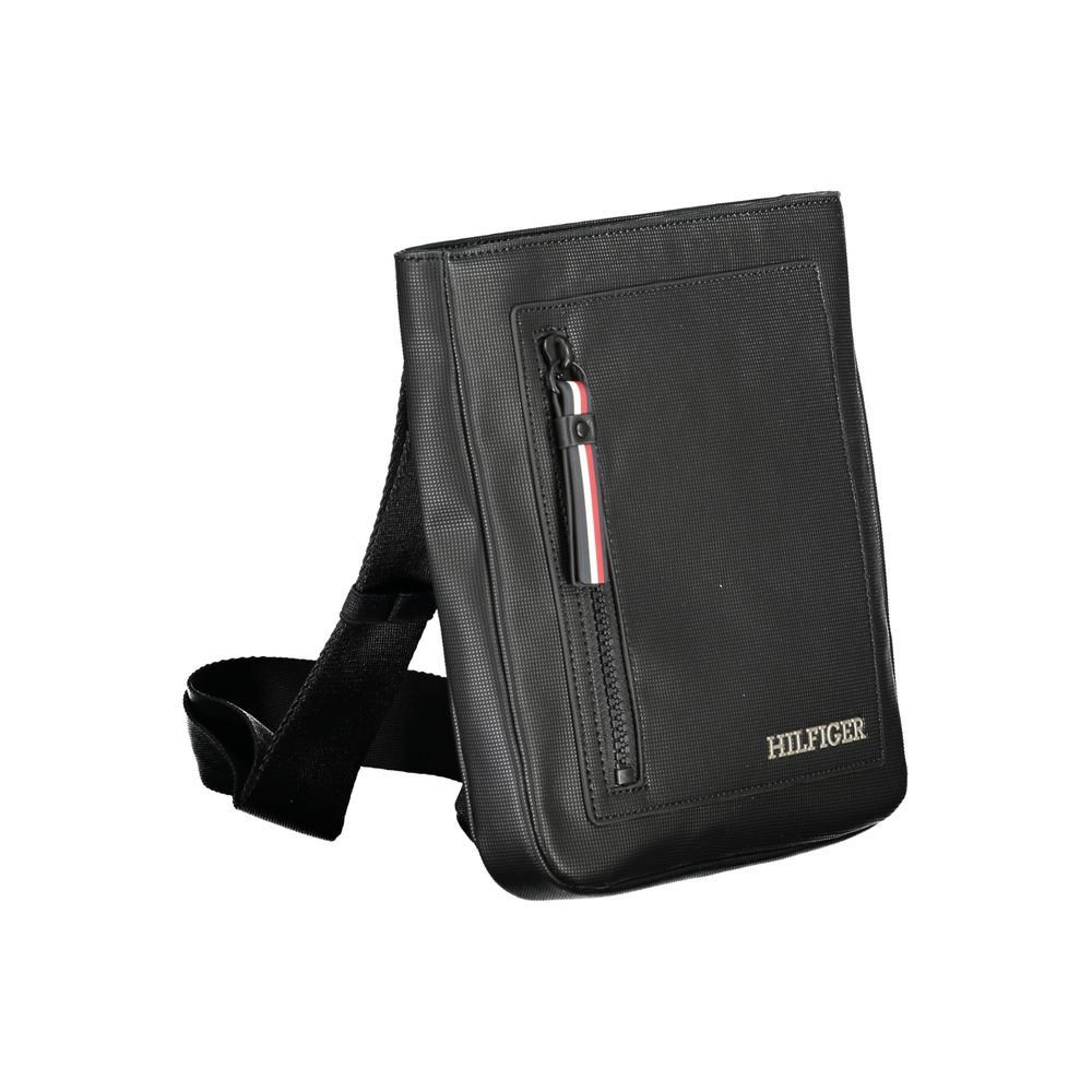 Sac à bandoulière pour homme Tommy Hilfiger en polyuréthane noir, élégant et pratique, avec détails modernes et logo visible.