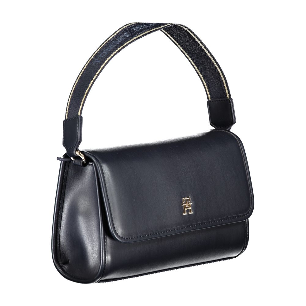 Sac à dos pour homme Tommy Hilfiger en polyester noir, avec logo distinctif et poches pratiques.