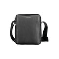 Sac à bandoulière pour homme Calvin Klein en polyester noir, design moderne et élégant visible sur l'image.