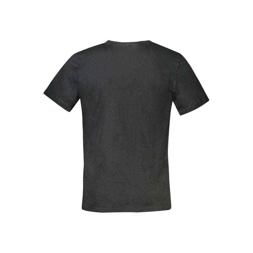 T-shirt homme Tommy Hilfiger en coton noir, à manches courtes et col rond, porté sur un modèle.