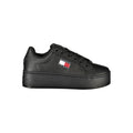 Sneaker femme en polyuréthane noir Tommy Hilfiger, chaussure décontractée avec semelle blanche et détails élégants.
