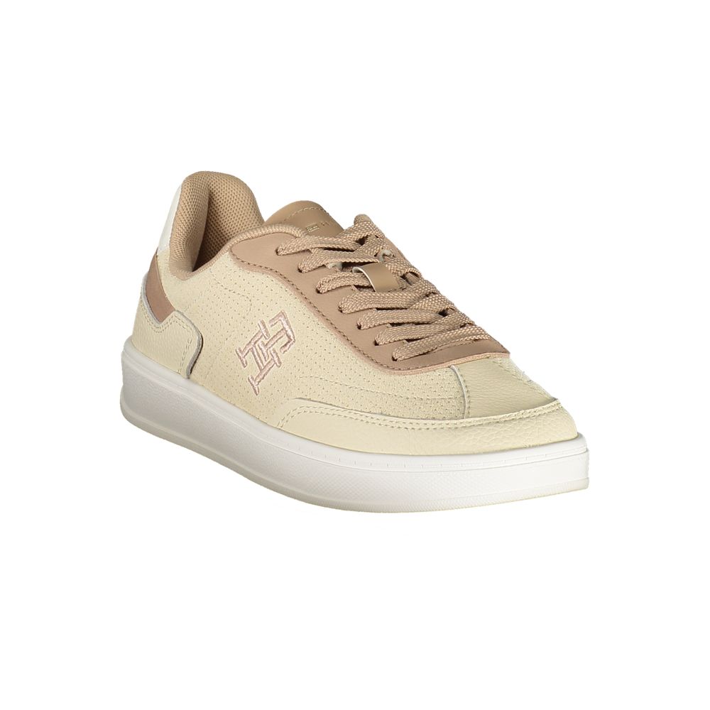 Chaussures femme Tommy Hilfiger sneakers en polyuréthane beige avec semelle blanche, style décontracté et moderne.