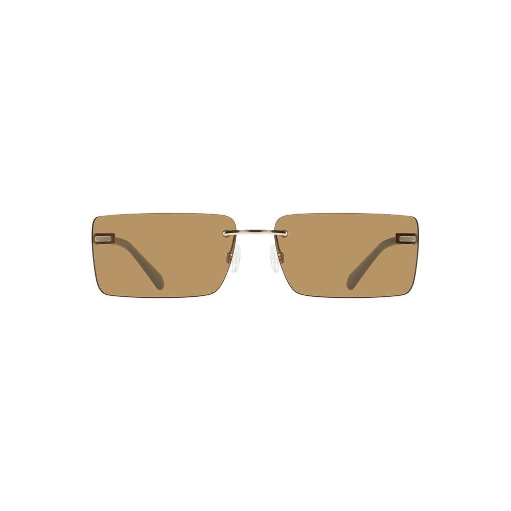 Lunettes de soleil pour femmes de Calvin Klein, monture en métal beige, style élégant et moderne.