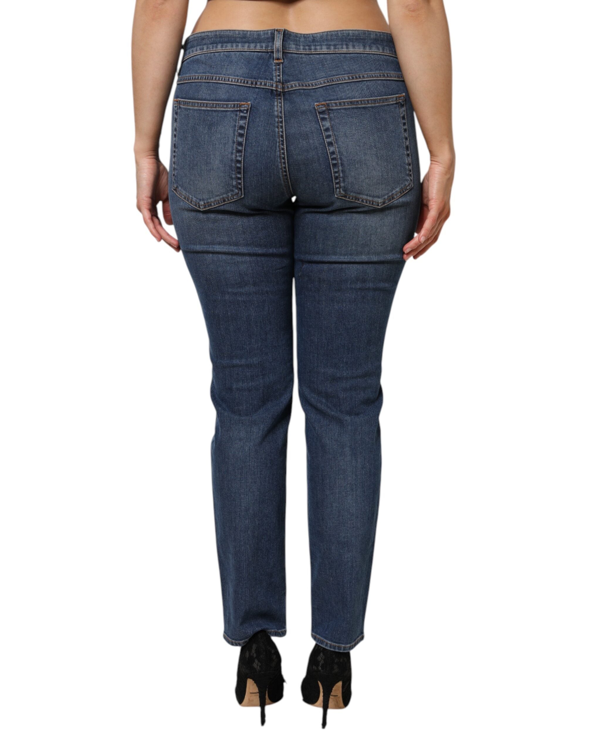Jeans skinny en denim coton bleu à taille basse Dolce & Gabbana, coupe ajustée et style moderne.