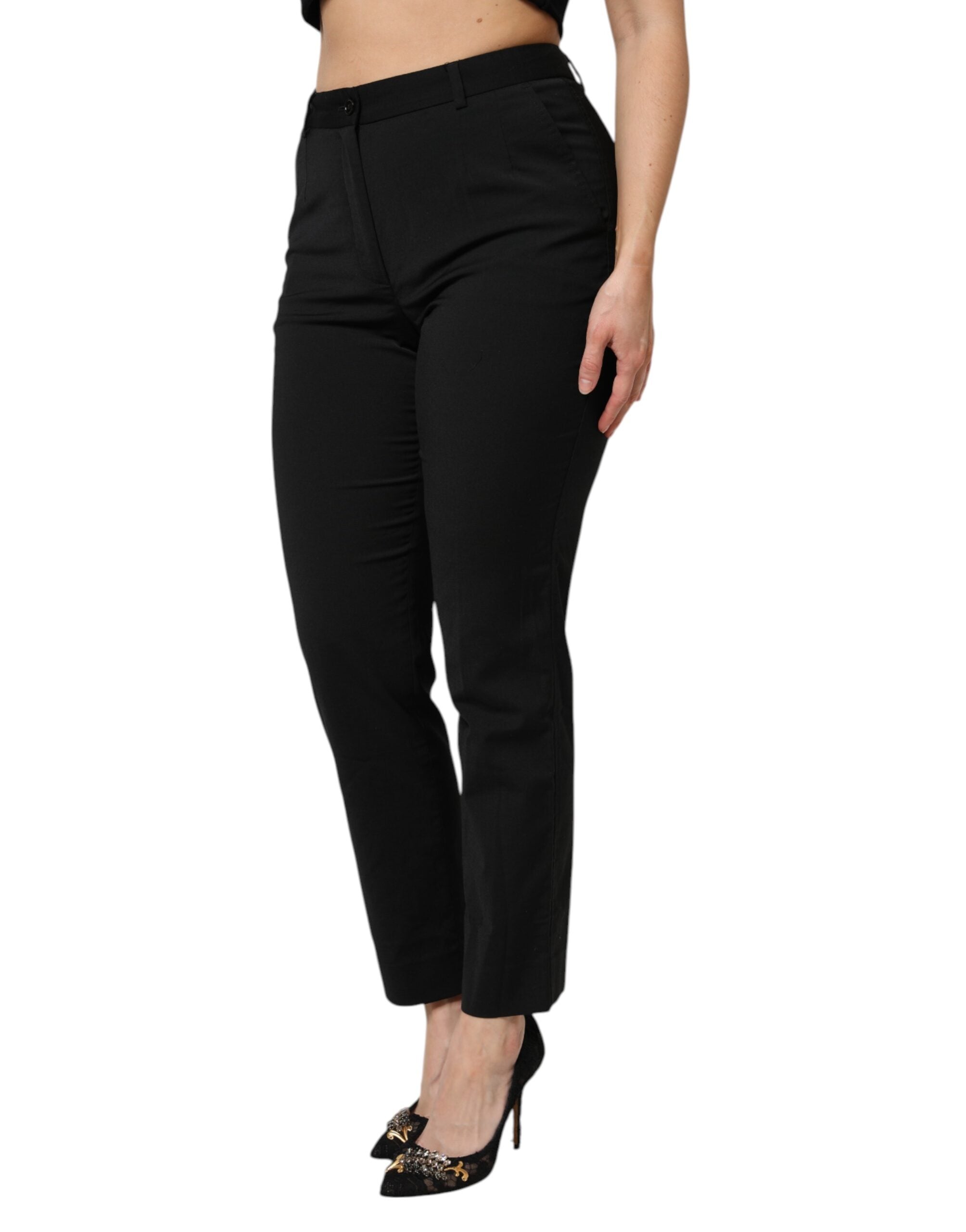 Pantalon Dolce & Gabbana noir taille haute à coupe tapered, style élégant et moderne, en tissu fluide.
