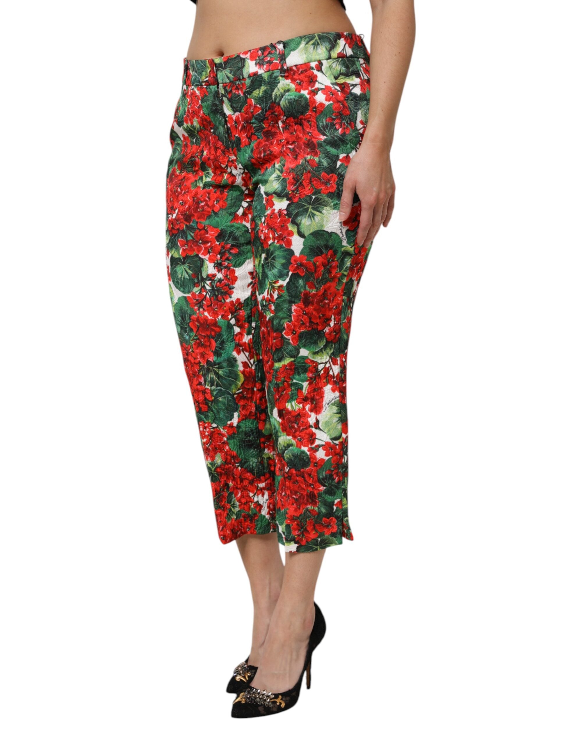 Pantalon cropped à fleurs multicolores Dolce & Gabbana, imprimé floral vibrant, tissu léger et style élégant.