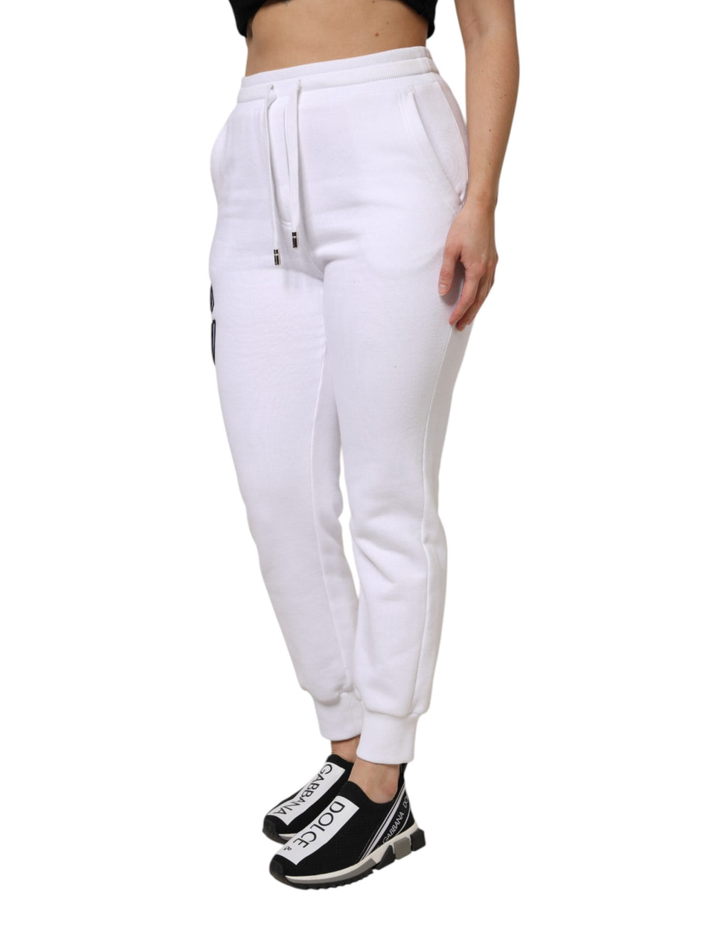 Pantalons de jogging Dolce & Gabbana en coton blanc extensible, style décontracté avec poches et taille élastique.