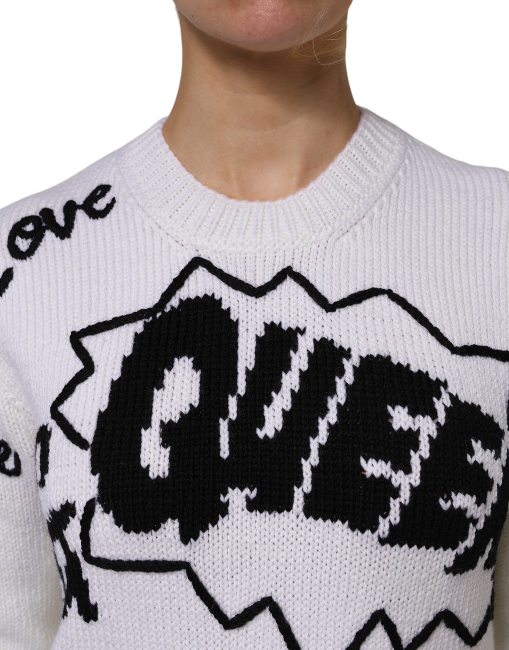Pull-over en laine blanche Dolce & Gabbana à col rond, tricoté, avec une texture douce visible.