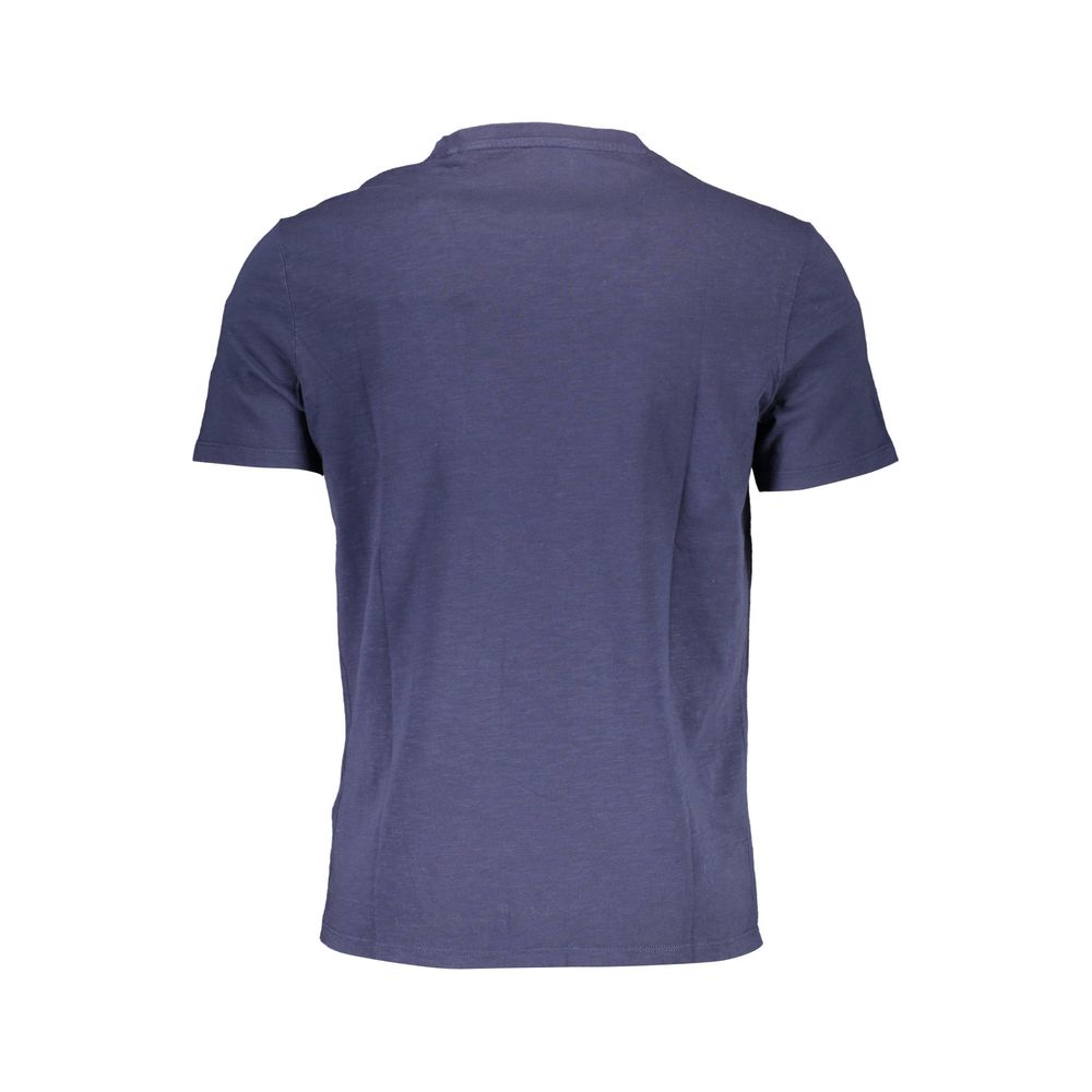 Chemise pour homme Guess Jeans en coton biologique bleu, style décontracté avec col et boutons visibles.