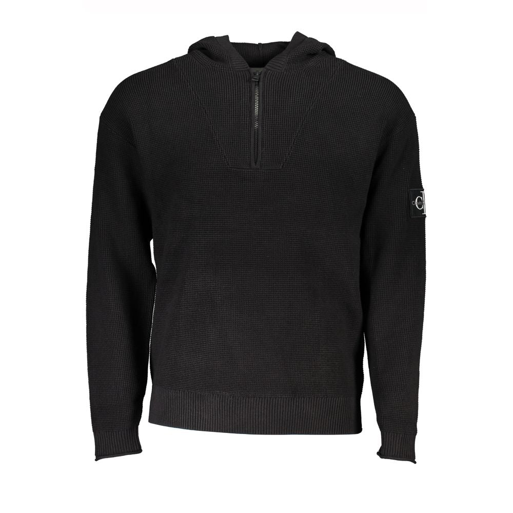 Pull à capuche en coton noir pour homme de la marque Calvin Klein, avec demi-zip visible, style décontracté et moderne.