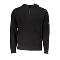 Pull à capuche en coton noir pour homme de la marque Calvin Klein, avec demi-zip visible, style décontracté et moderne.