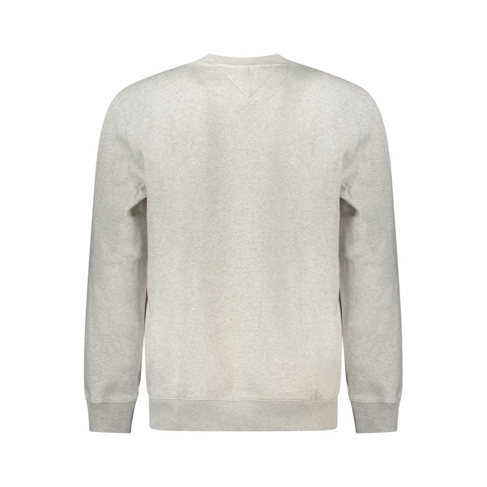 Sweatshirt pour homme Tommy Hilfiger en coton gris, style décontracté avec logo sur la poitrine.