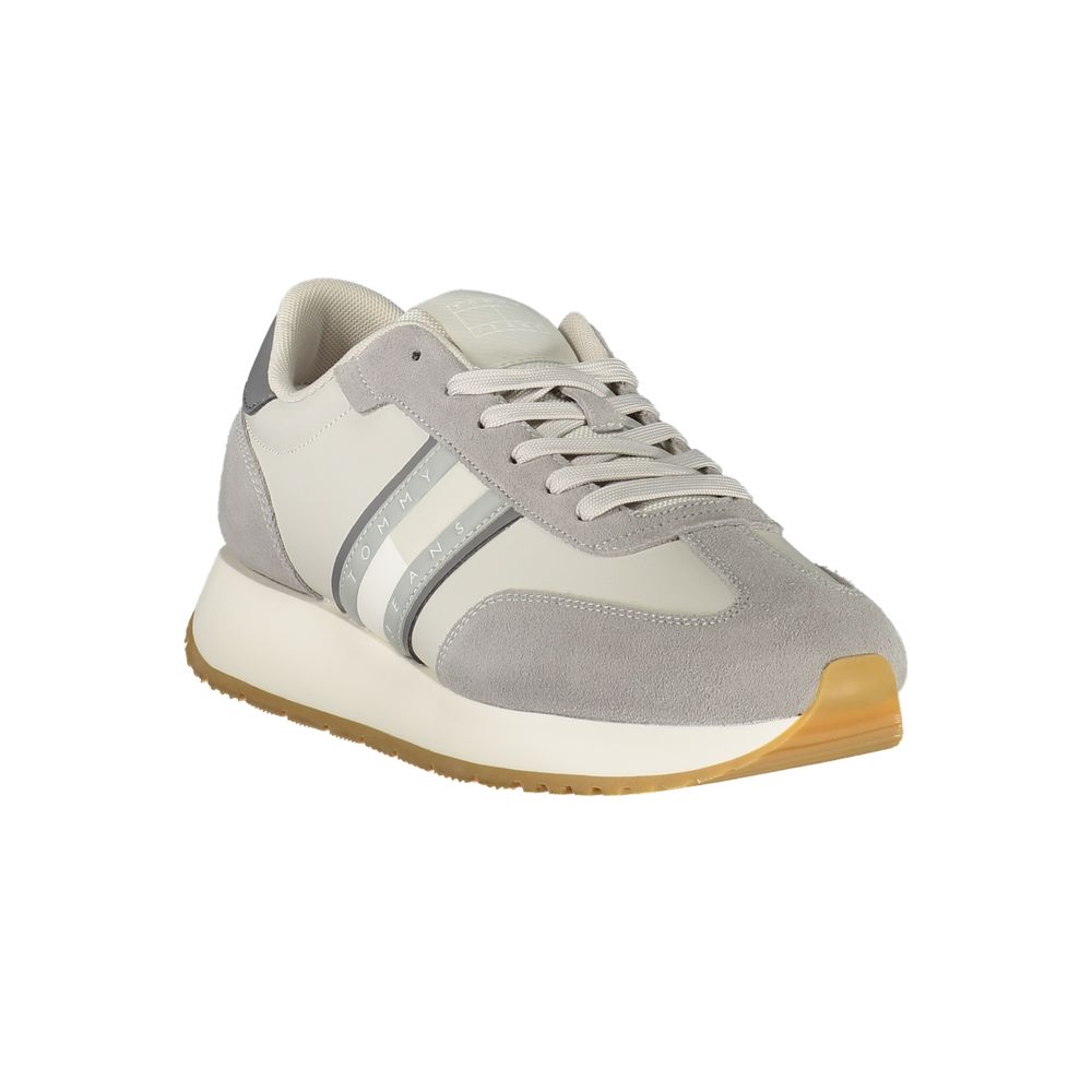 Sneakers pour homme Tommy Hilfiger en polyuréthane gris, mode décontractée avec semelle blanche.