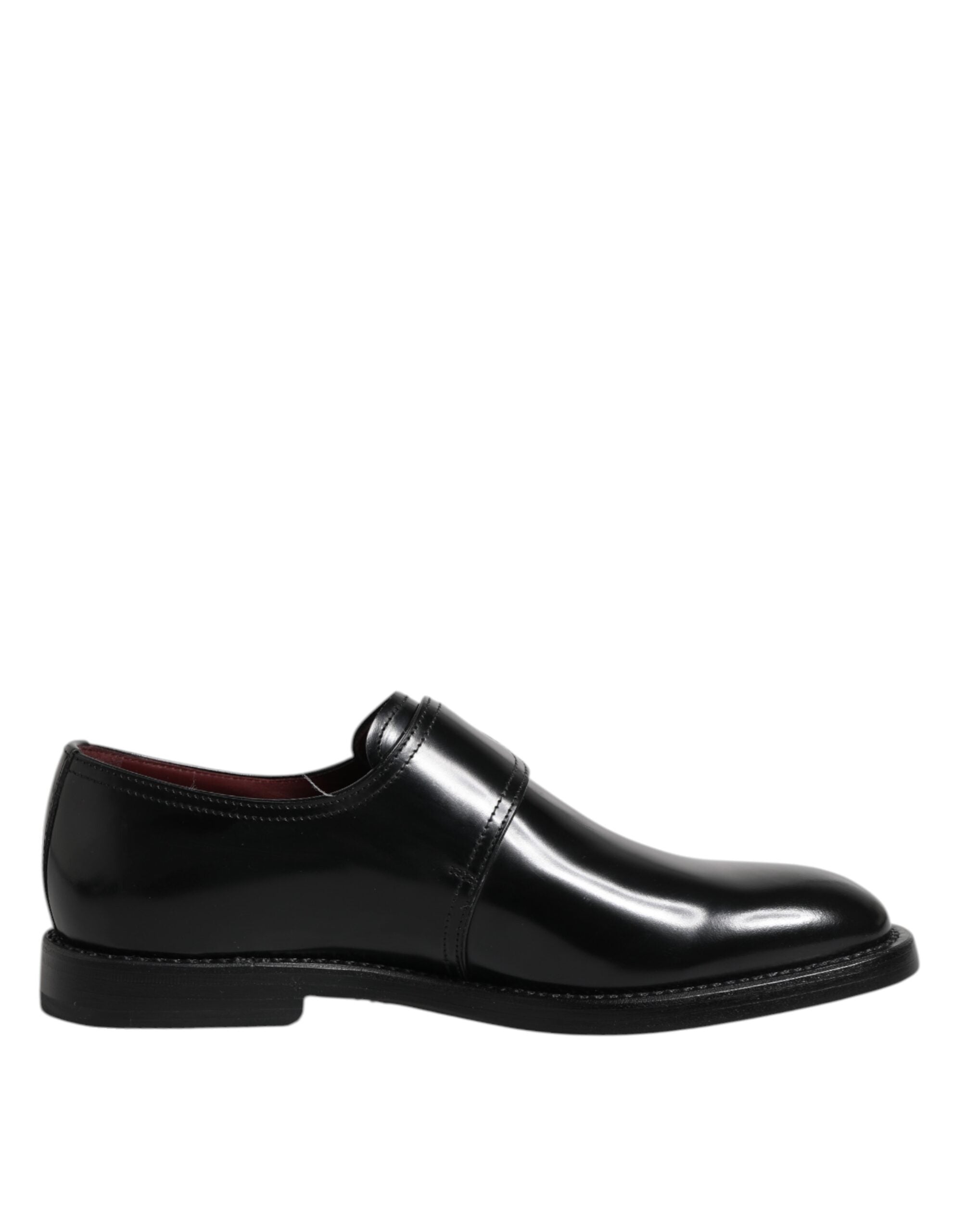 Chaussures Derby formelles en cuir noir Dolce & Gabbana avec boucle monk strap, élégantes et sophistiquées.
