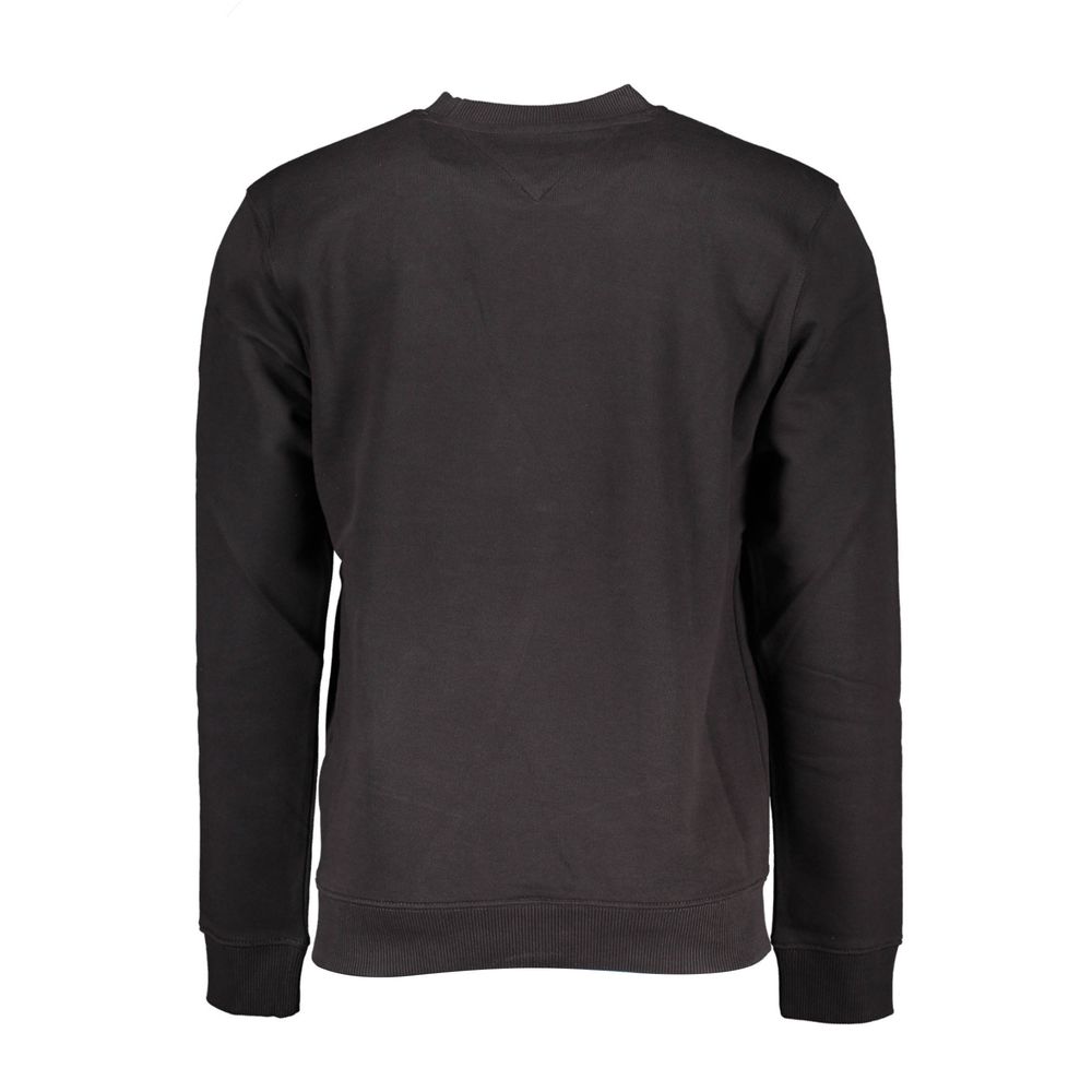 Sweatshirt homme en coton noir Tommy Hilfiger avec logo discret, col rond et manches longues, vue de face.