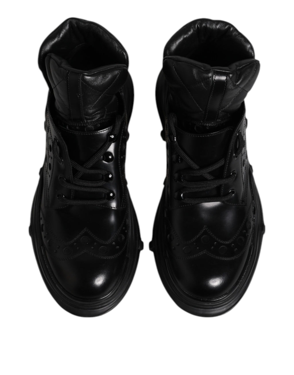 Chaussures homme Dolce & Gabbana en cuir noir, bottines décontractées à la cheville, style élégant et moderne.