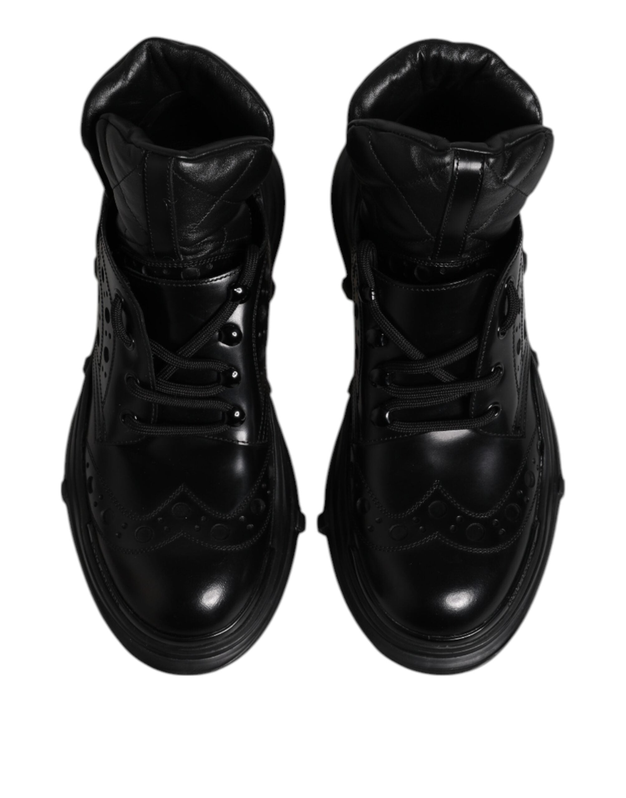 Chaussures homme Dolce & Gabbana en cuir noir, bottines décontractées à la cheville, style élégant et moderne.