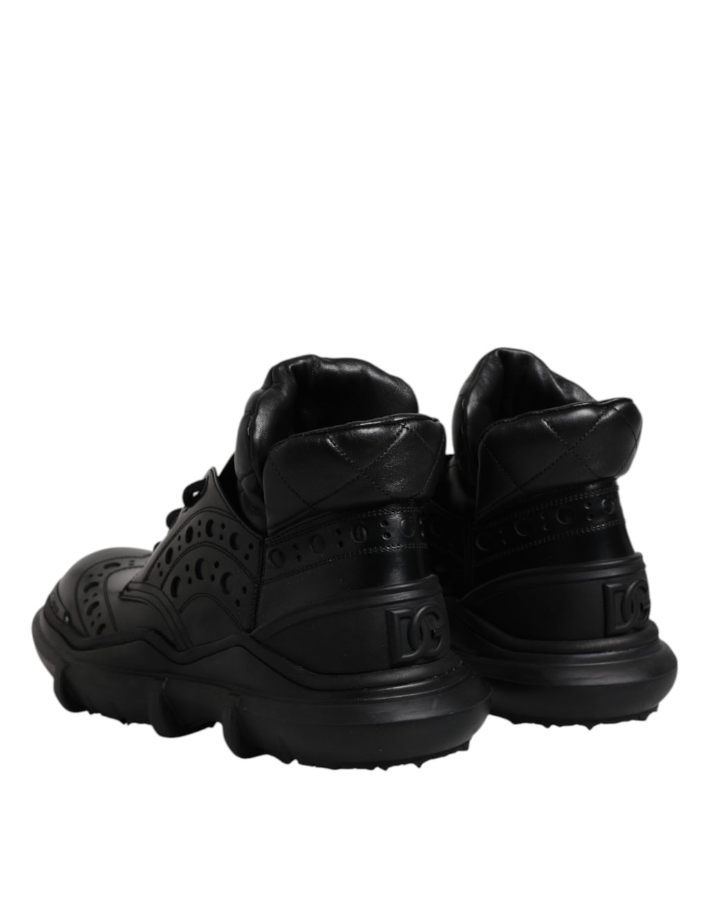 Chaussures pour hommes Dolce & Gabbana en cuir noir, bottines décontractées à la cheville, style élégant et moderne.