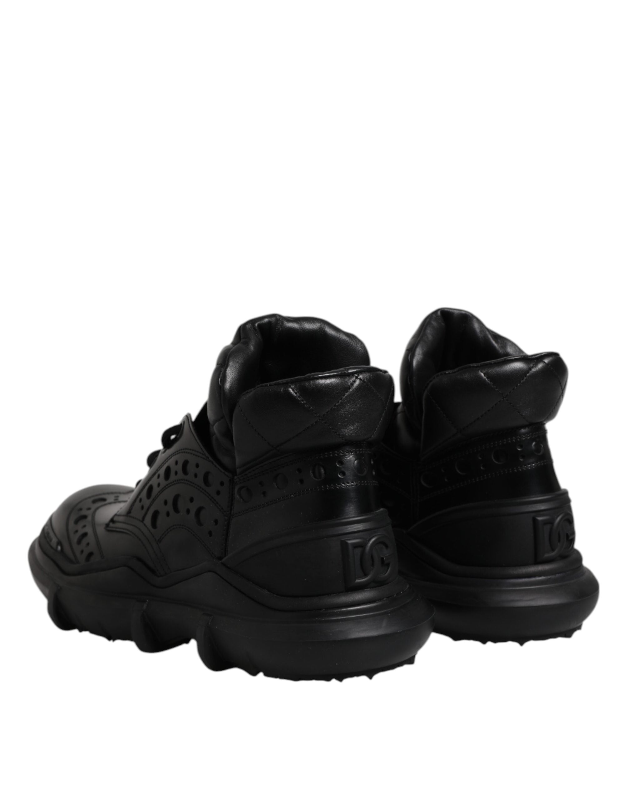 Chaussures pour hommes Dolce & Gabbana en cuir noir, bottines décontractées à la cheville, style élégant et moderne.