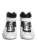 Chaussures sneakers montantes en cuir noir et blanc de Dolce & Gabbana, style haut de gamme et moderne.