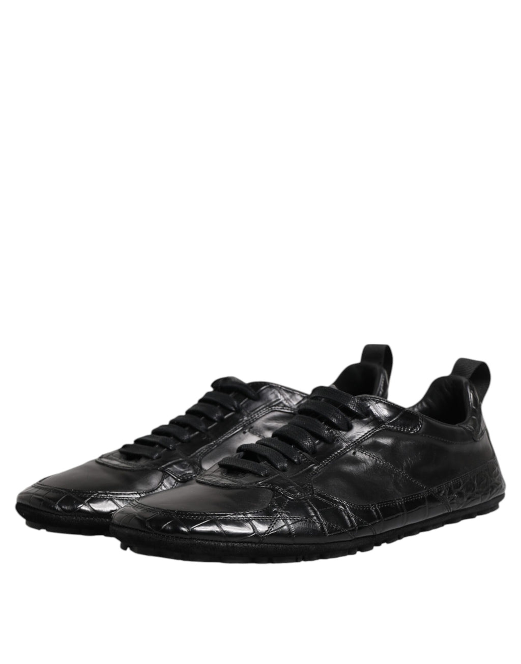 Chaussures sneakers basses en cuir exotique noir de Dolce & Gabbana, style élégant et moderne.