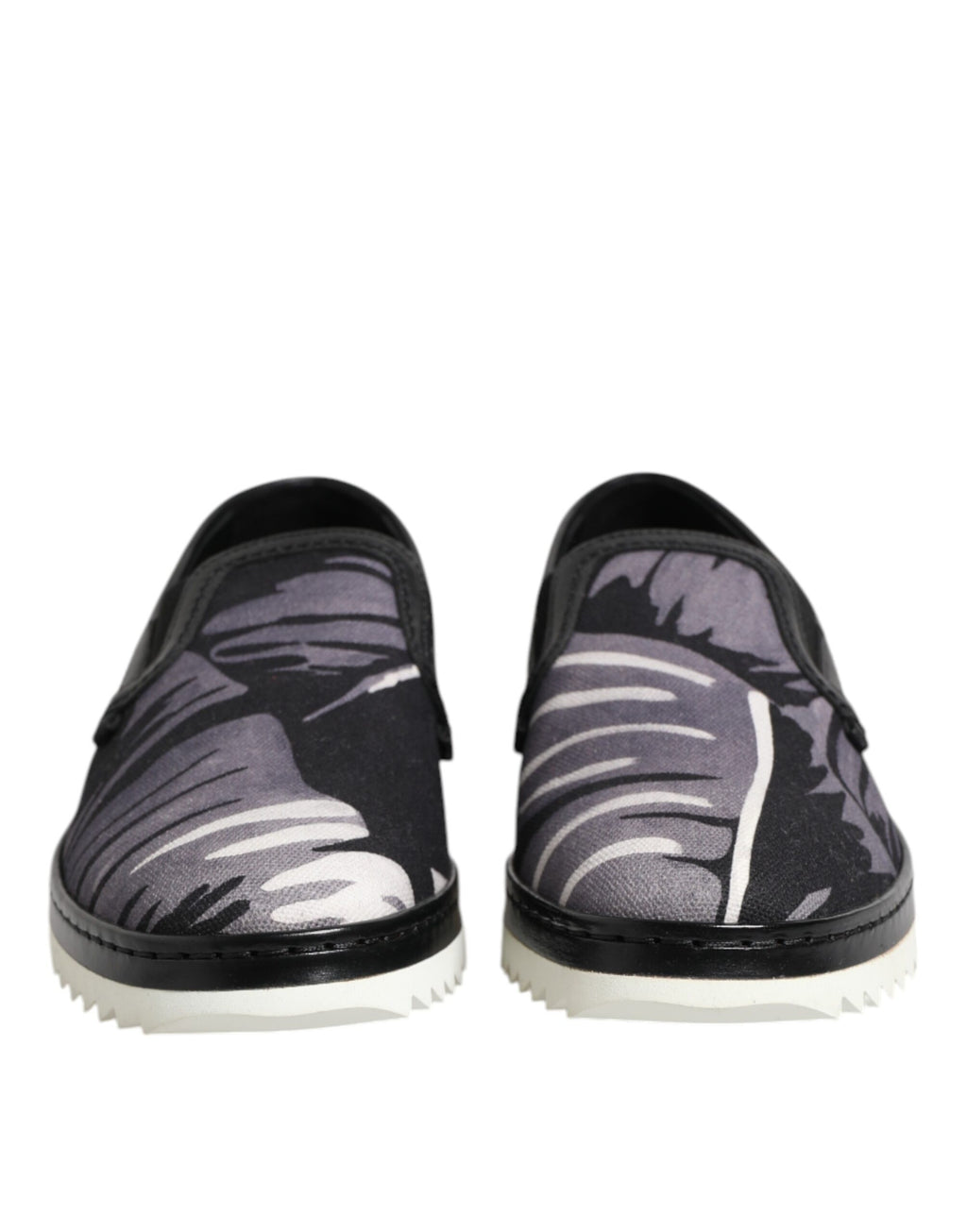 Chaussures sneakers homme Dolce & Gabbana Noires à motif tropical, slip-on, look élégant et tendance.