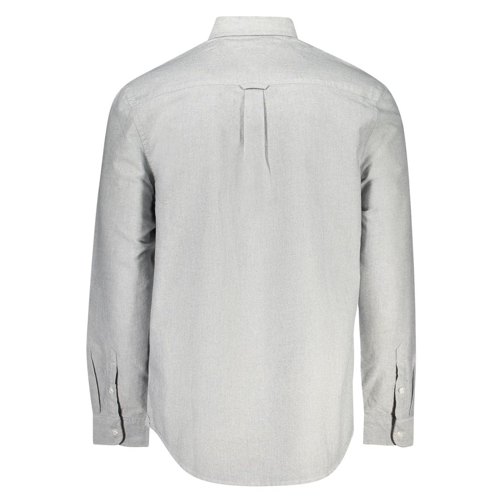 Chemise en coton gris Tommy Hilfiger pour homme, col classique et manches longues, portée décontractée élégante.