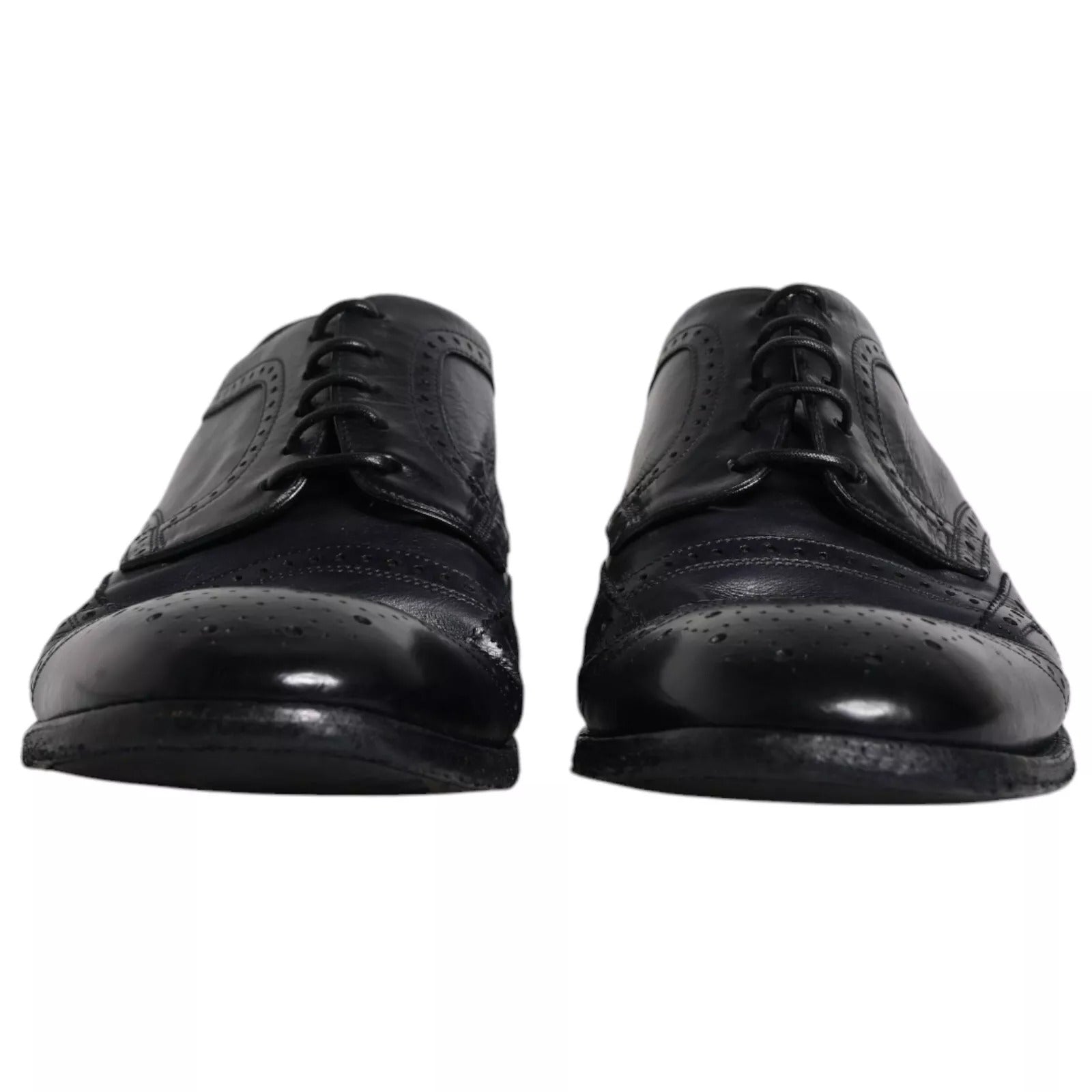 Chaussures derby en cuir bleu foncé de Dolce & Gabbana, chaussures formelles wingtip pour homme, détails élégants en cuir.