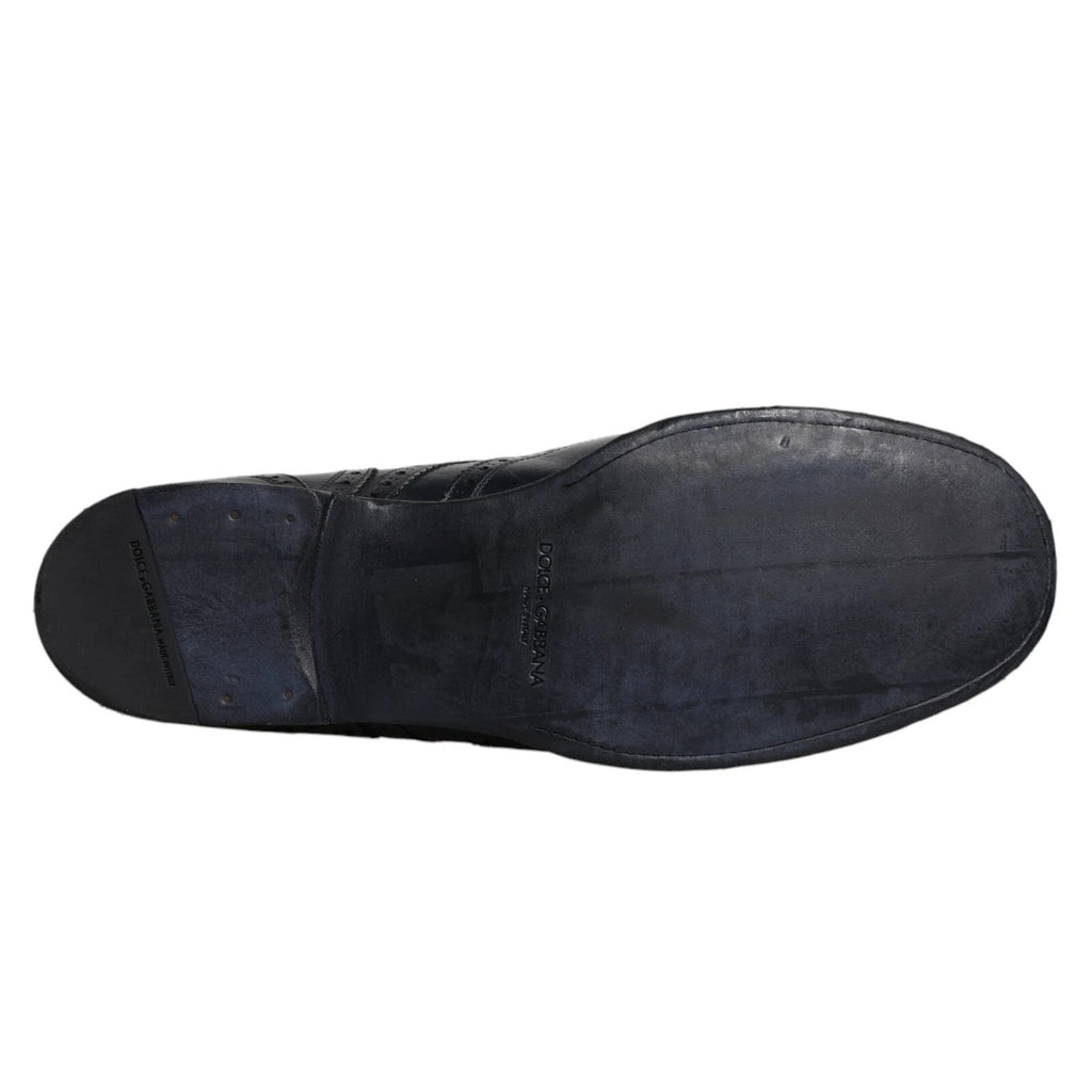 Chaussures derby en cuir bleu foncé Dolce & Gabbana, élégantes et formelles avec détails wingtip.