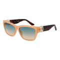 Lunettes de soleil Guess en acier inoxydable beige, avec monture élégante et branches minces, pour un style sophistiqué.