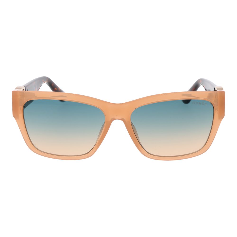 Lunettes de soleil Guess en acier inoxydable beige avec montures élégantes et branches fines, pour un style sophistiqué.