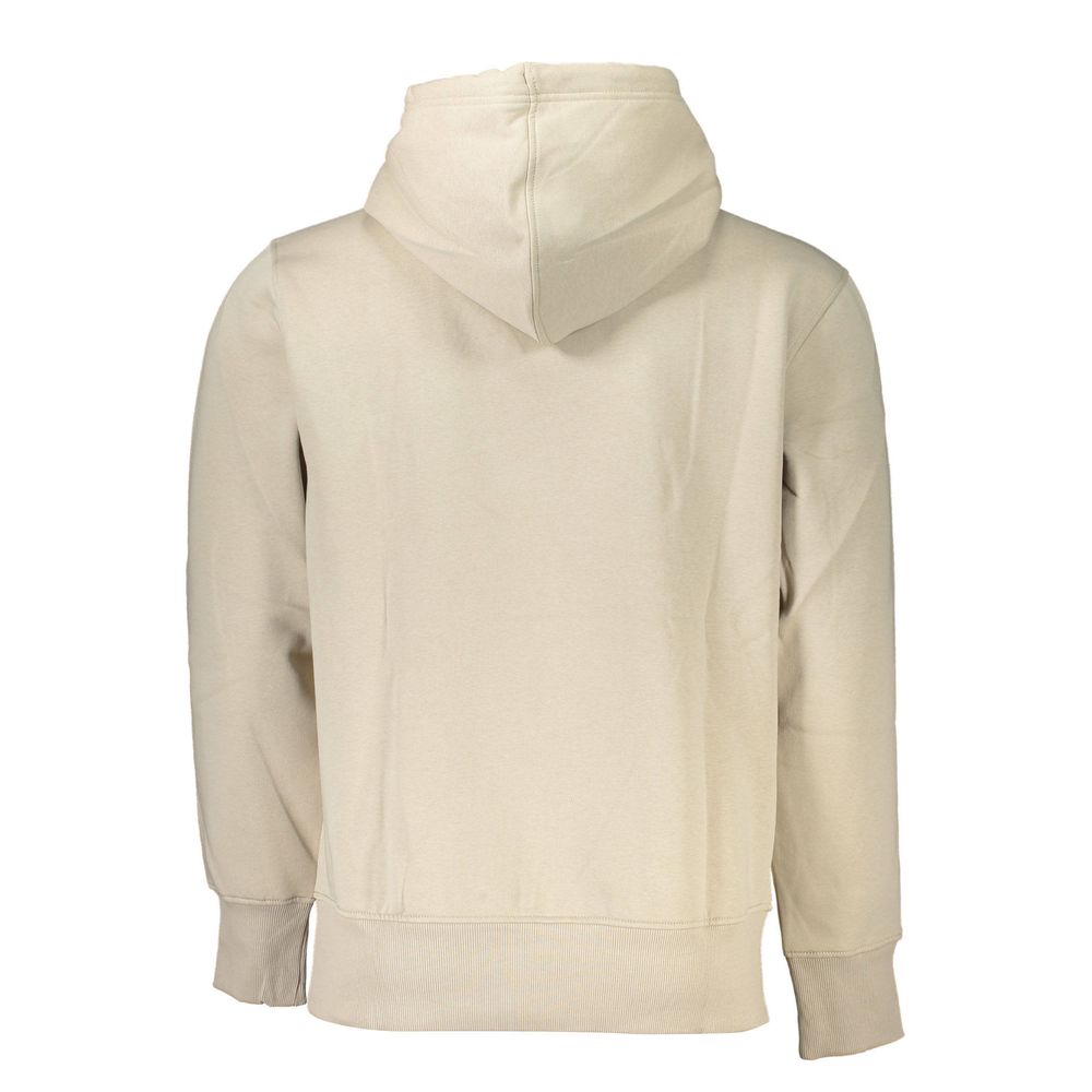 Pull en coton beige pour homme de la marque Calvin Klein, avec col rond et finition douce visible sur l'image.