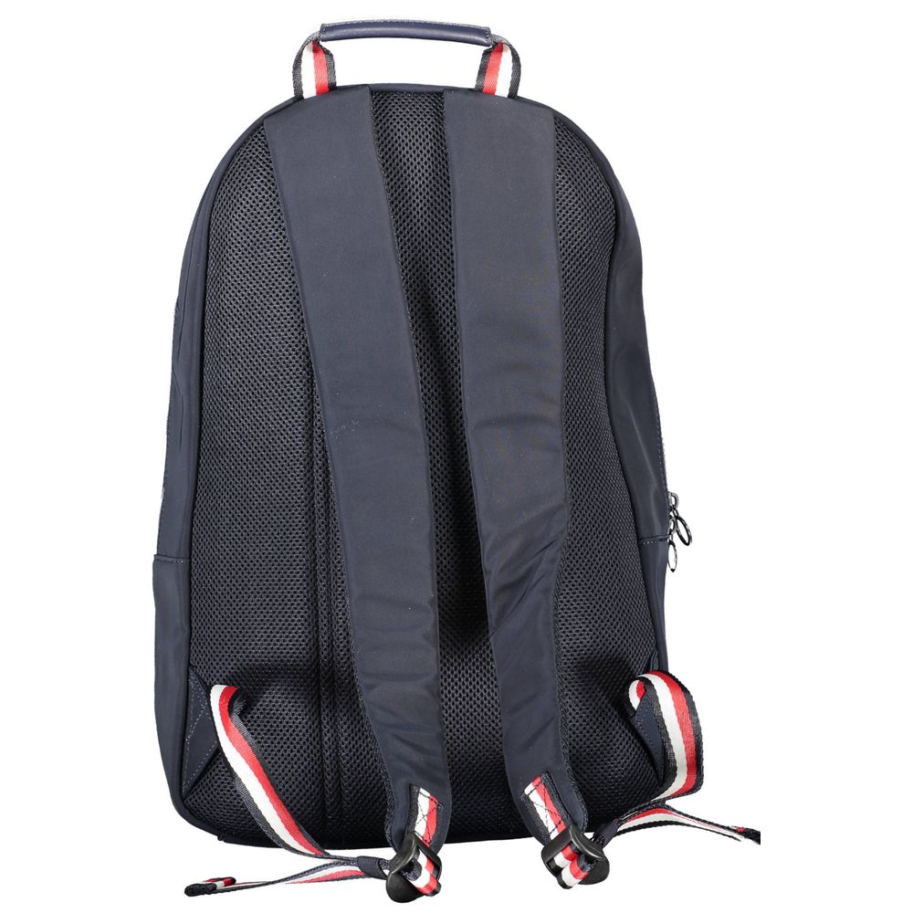 Sac à dos homme Tommy Hilfiger en polyester bleu avec plusieurs compartiments et logo signature visible.