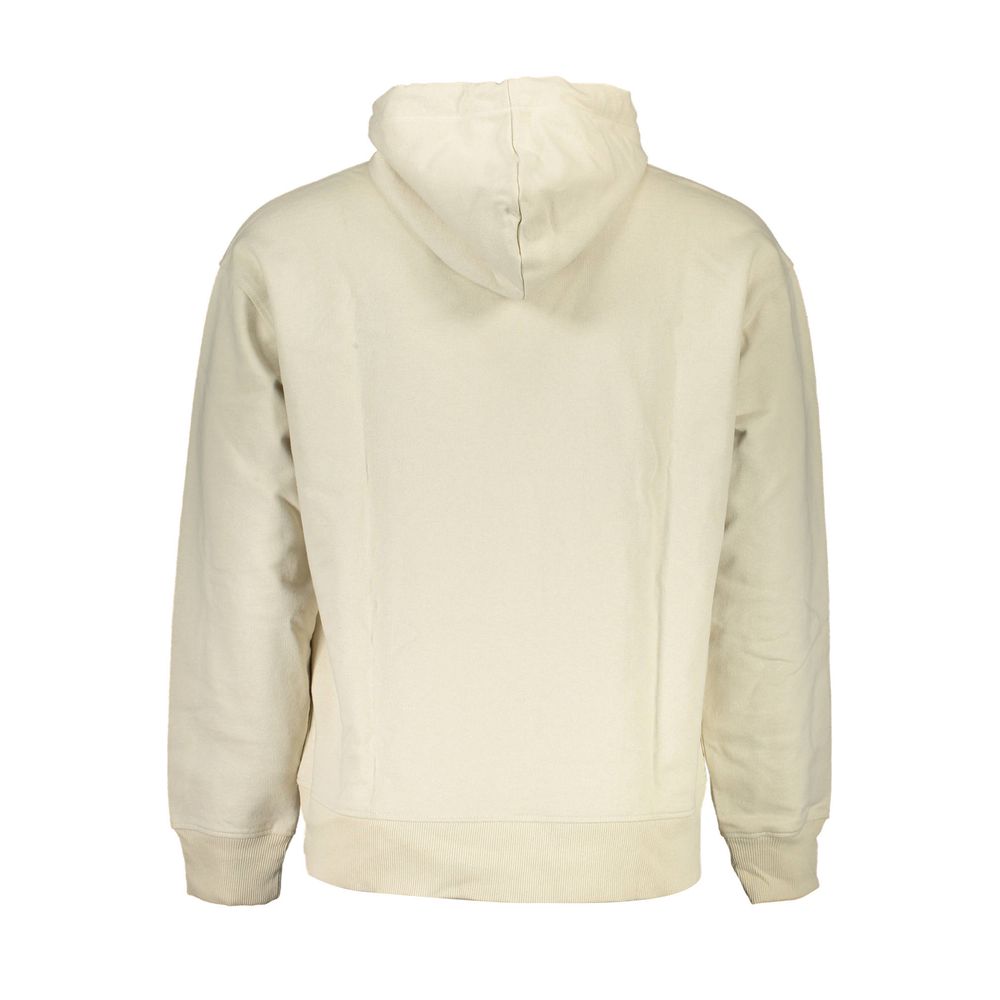 Sweat-shirt beige en coton pour homme de la marque Calvin Klein, coupe classique et logo discret visible sur le devant.