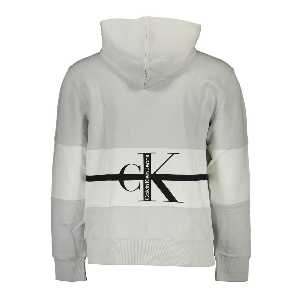 Sweat-shirt gris en coton pour homme de Calvin Klein, col rond et style décontracté, visible sur l'image.
