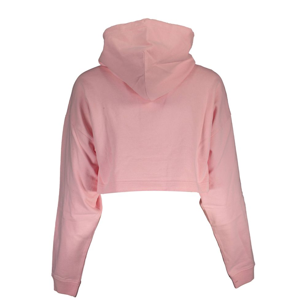 Pull en coton rose pour femme de la marque Tommy Hilfiger, avec col rond et manches longues, porté sur un modèle.