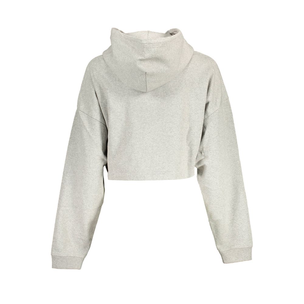 Sweatshirt pour femme Tommy Hilfiger en coton gris, coupe décontractée, col rond et logo emblématique sur la poitrine.