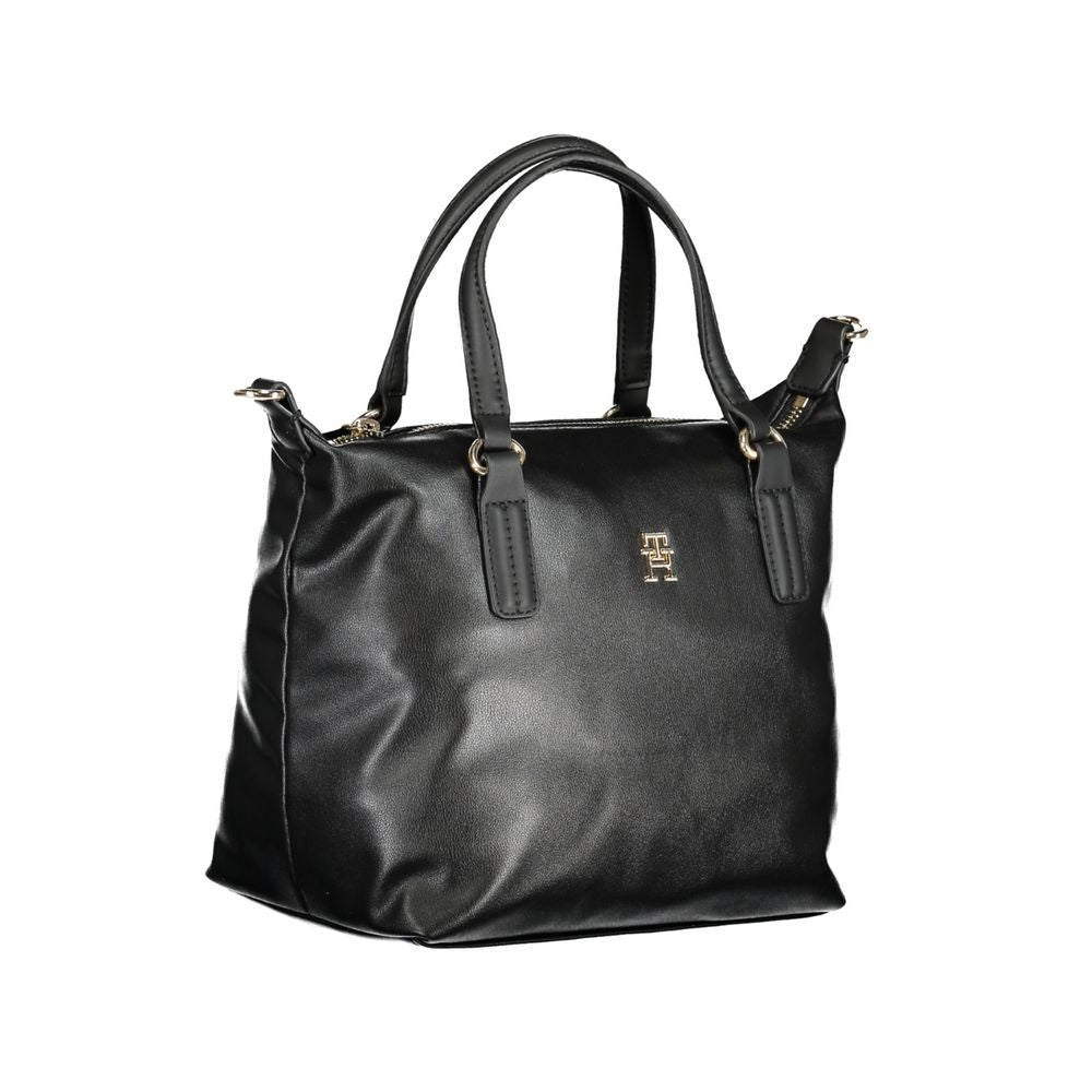 Sac à main noir en polyester Tommy Hilfiger pour femme, sac élégant avec poignée et détails de marque visibles.