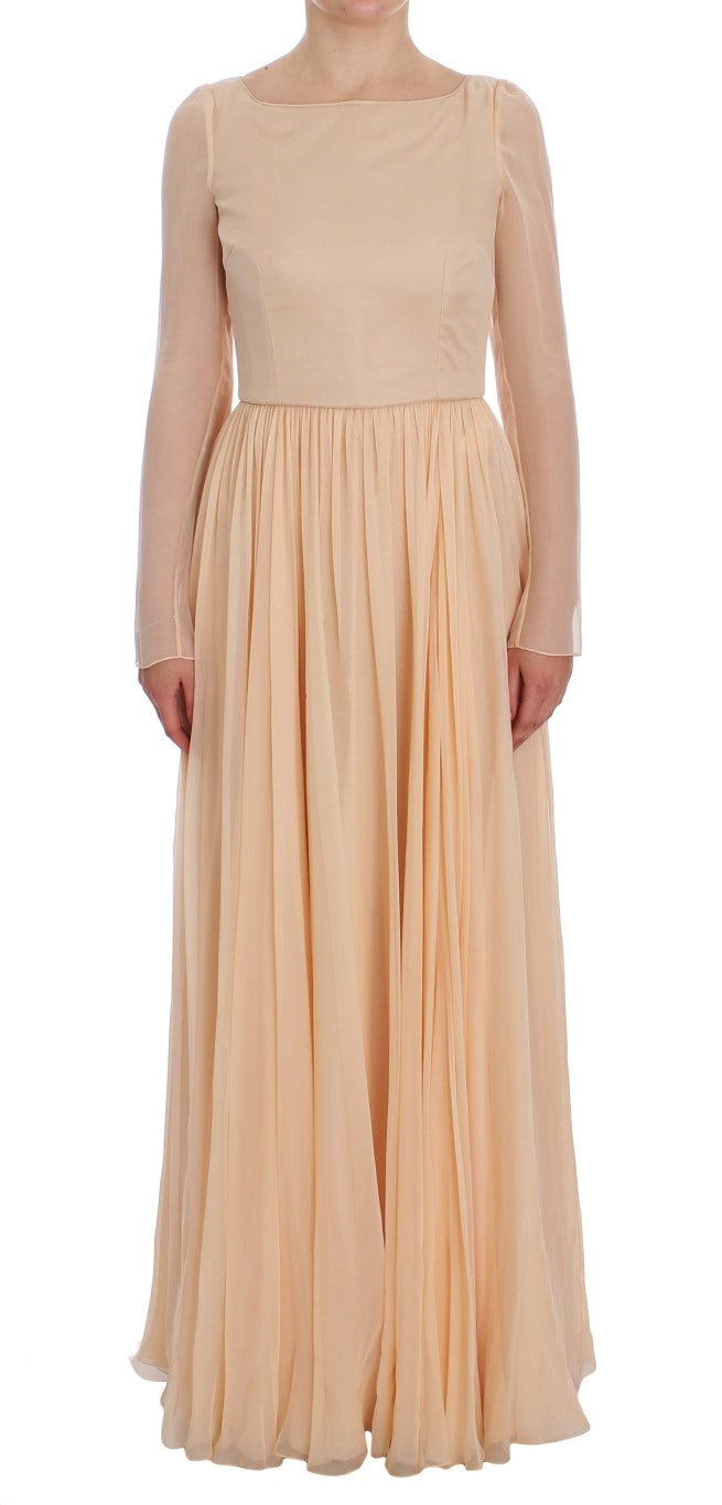 Robe de soirée longue en soie beige de Dolce & Gabbana, robe de bal élégante et sophistiquée, vue de face.