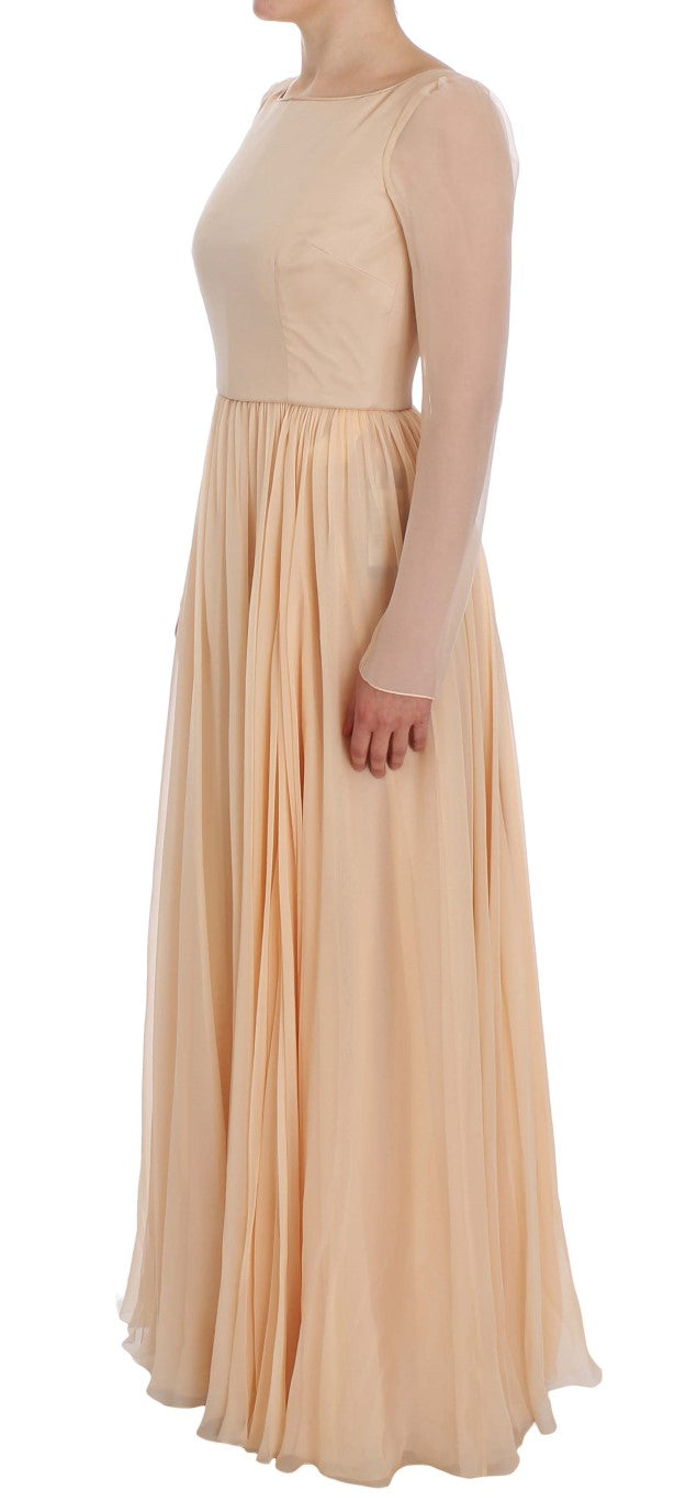 Robe de soirée longue en soie beige de Dolce & Gabbana, style élégant et sophistiqué, vue de face.