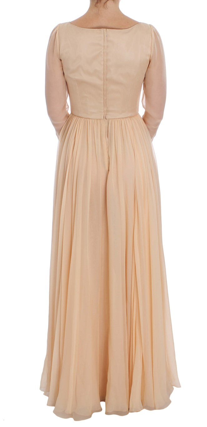 Robe de soirée en soie beige Dolce & Gabbana, robe longue élégante avec détails sophistiqués et coupe fluide.