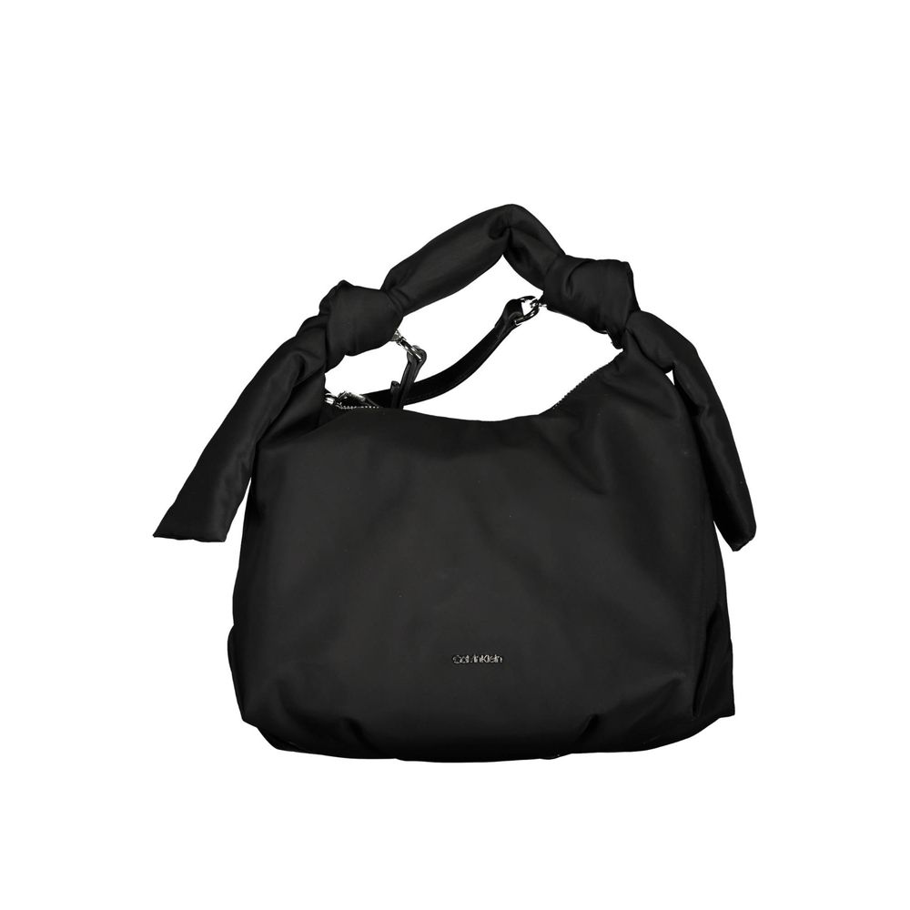 Sac à main pour femme Calvin Klein en polyester noir, avec poignées élégantes et design moderne visible sur l'image.