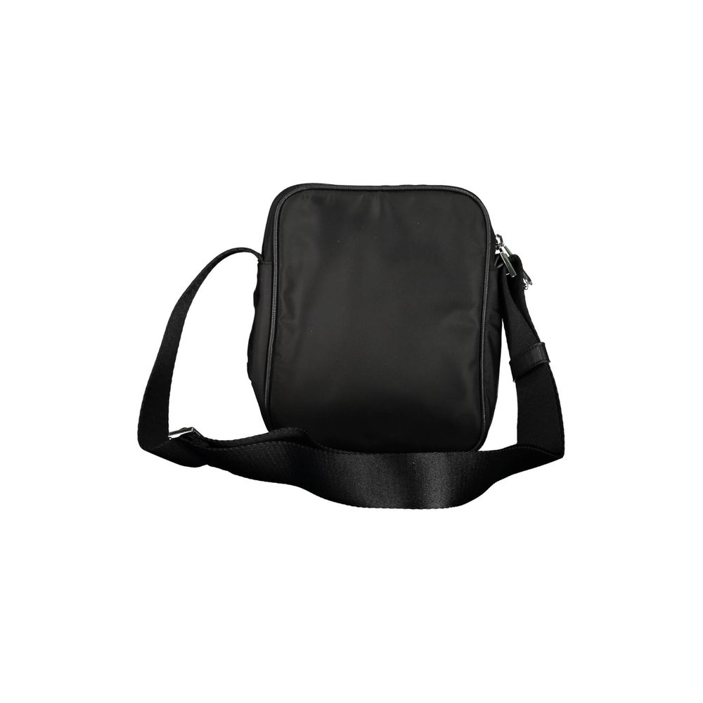 Sac à bandoulière pour homme Calvin Klein en polyester noir, vue de face montrant la bandoulière et le logo.
