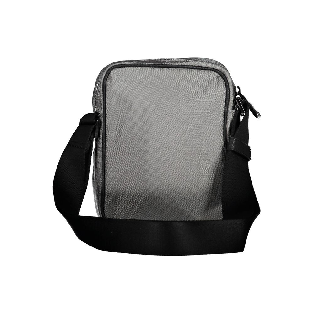 Sac à bandoulière pour homme Calvin Klein gris en polyester, élégant et pratique, avec compartiments spacieux.