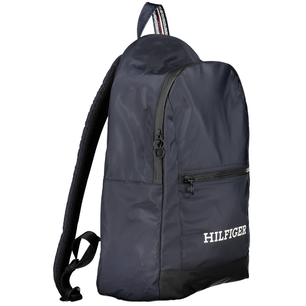 Sac à dos pour homme Tommy Hilfiger en polyester bleu, avec compartiments et design moderne visible sur l'image.