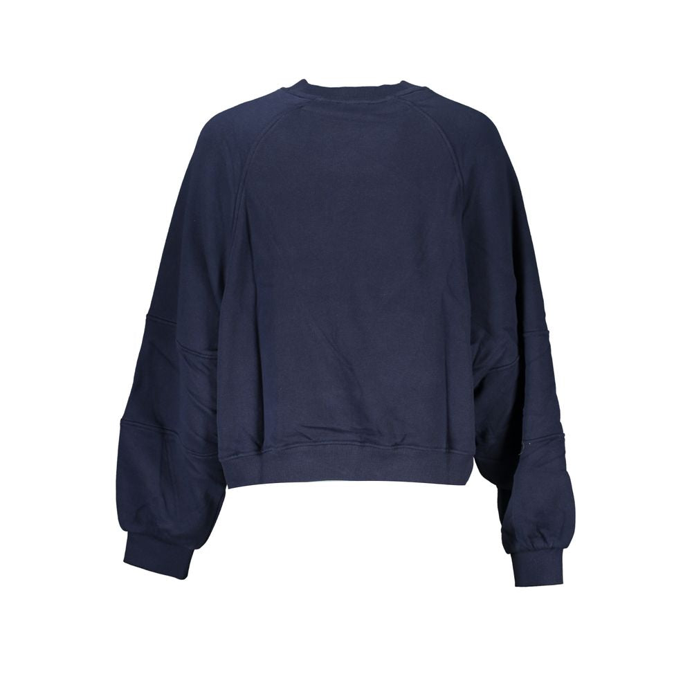 Sweatshirt femme en coton bleu Tommy Hilfiger avec logo sur la poitrine, confort et style décontracté.