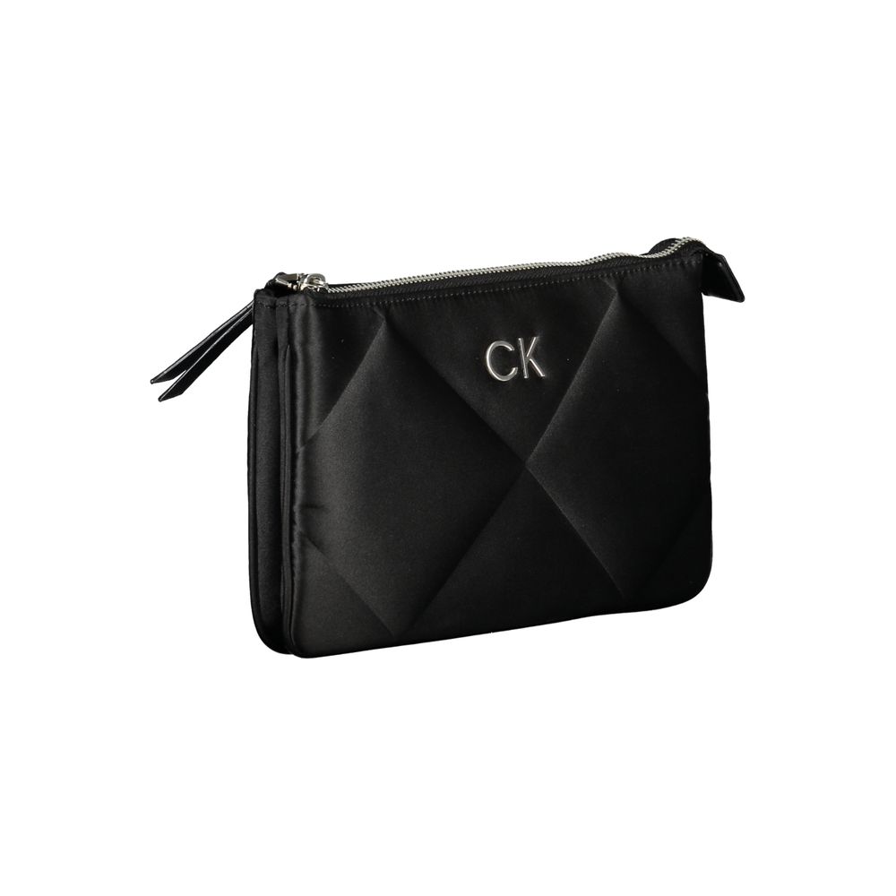 Sac à main pour femmes Calvin Klein en polyester noir, sac à épaule élégant et pratique, avec détails modernes.