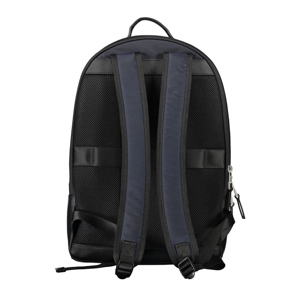 Sac à dos homme Tommy Hilfiger en polyester bleu, avec poches et bretelles réglables, pour un style pratique et élégant.